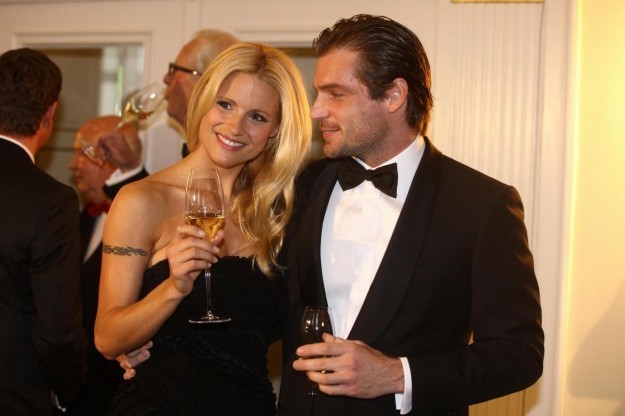 Michelle Hunziker e Tomaso Trussardi a una festa